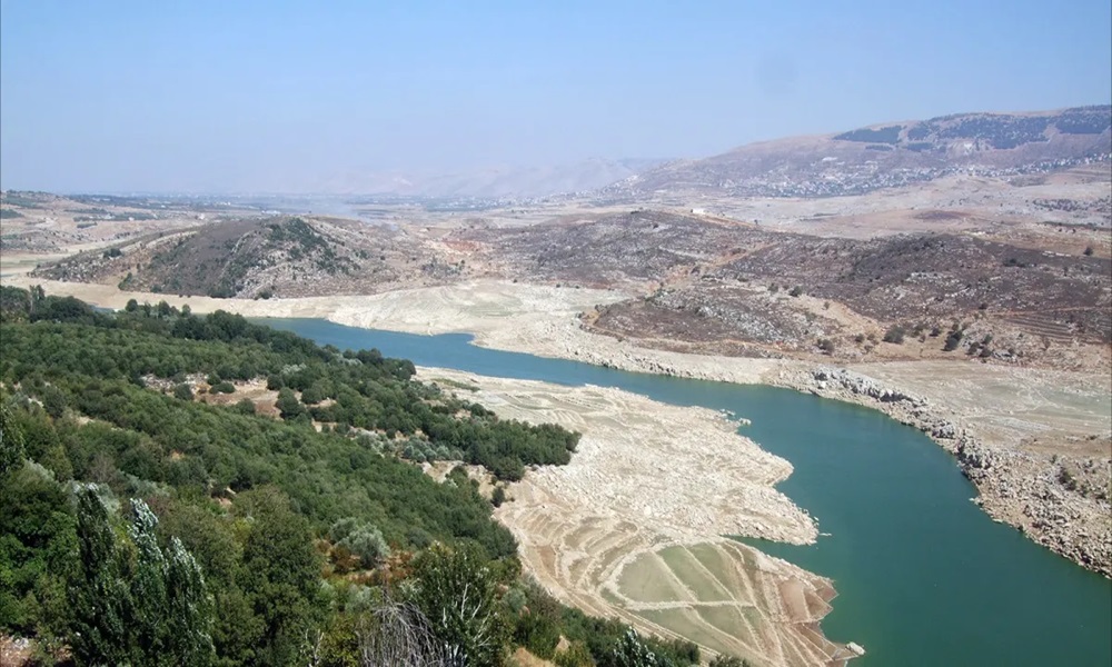 فتح مجرى نهر الغزيل بعد انسداده بالنفايات