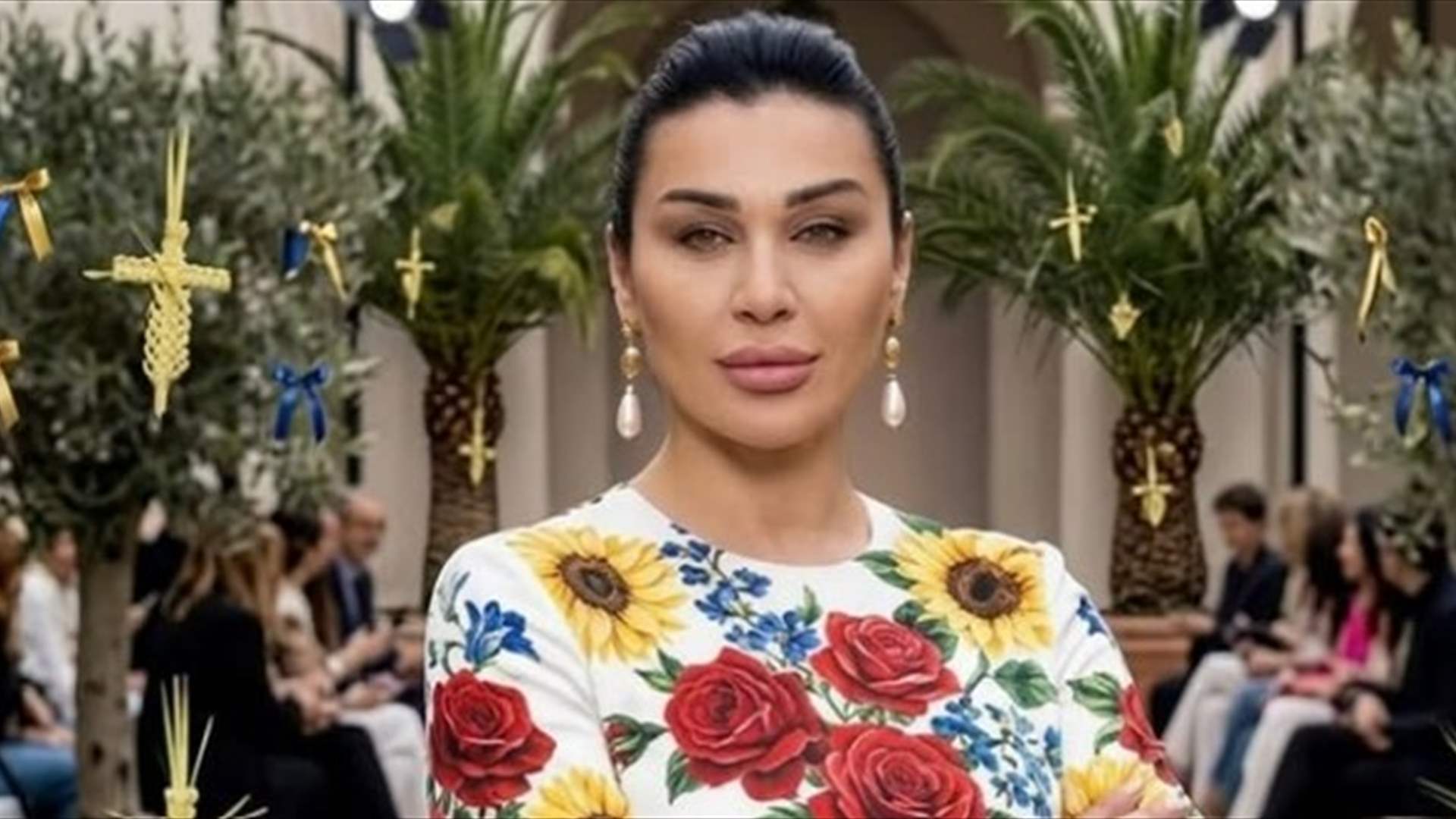 نادين الراسي ترتدي العلم اللبناني: "إنّ الثورة تولد من رحم الأحزان"